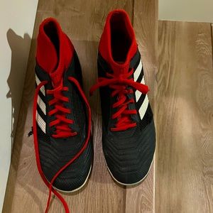 Turf Soccer shoes. Small scratch but it It’s fully cover inside